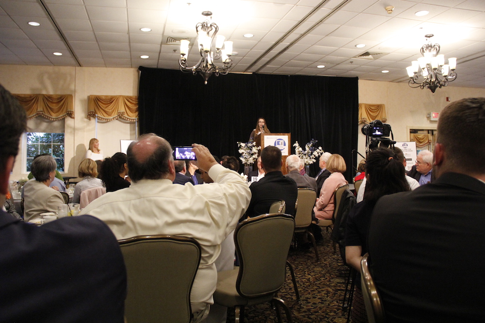 A student speaking at the Harold Grinspoon Awards